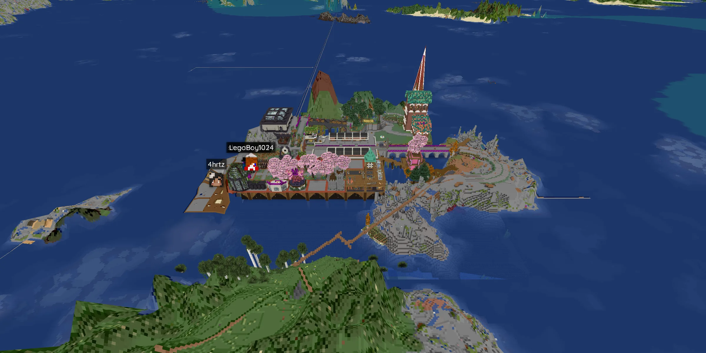 Homestead's spawn town on its island — cherry-blossom boardwalk shops, a church spire, and railway bridges reaching across the water.