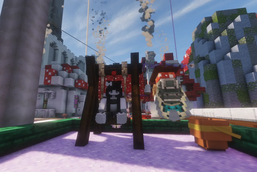 Two players sit on swings in a bright mushroom-themed park, with red-and-white buildings, cliffs, and chimney smoke behind them.