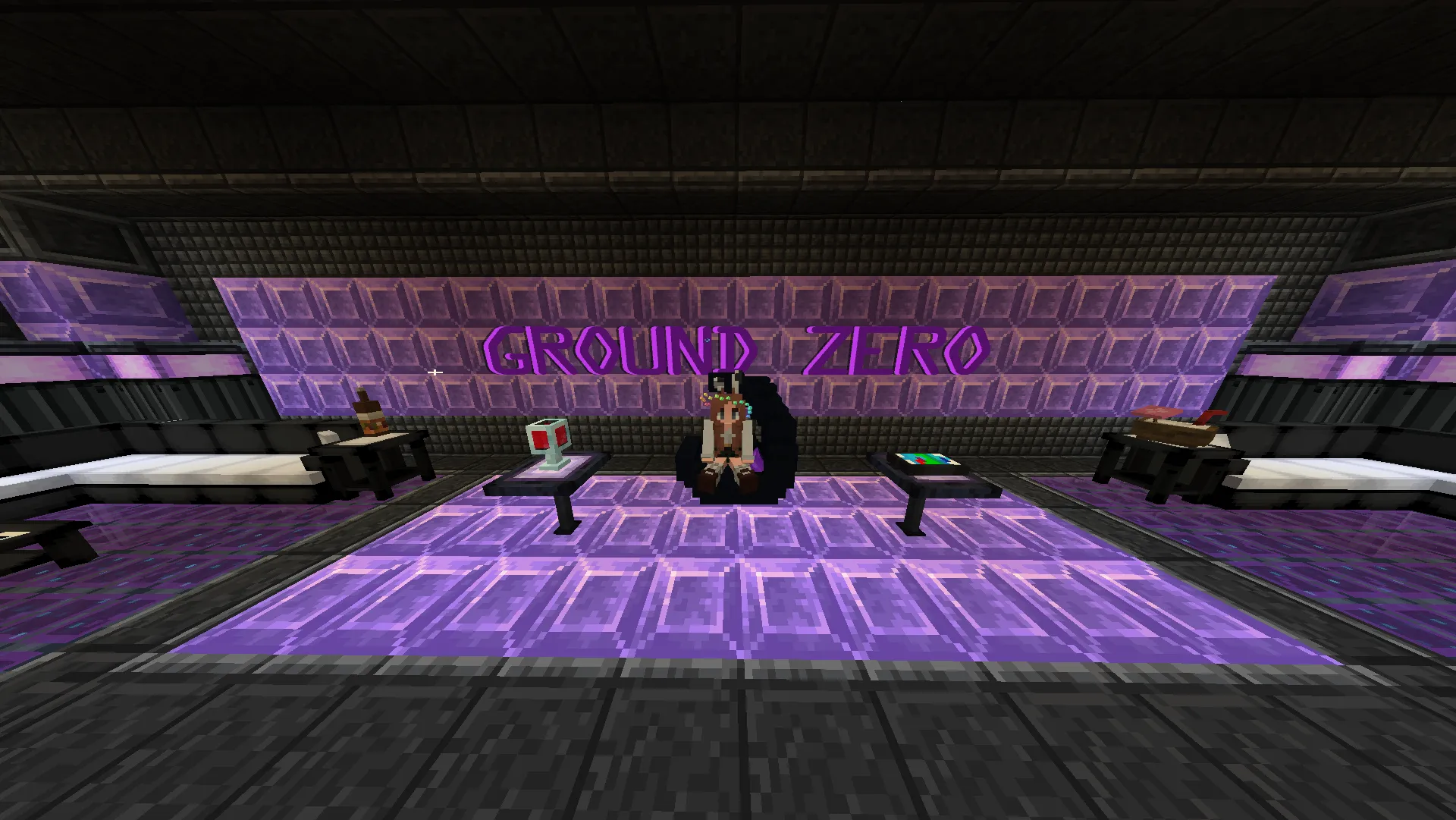 The purple-lit Ground Zero club lounge, centered on its neon sign, tables, and seating.