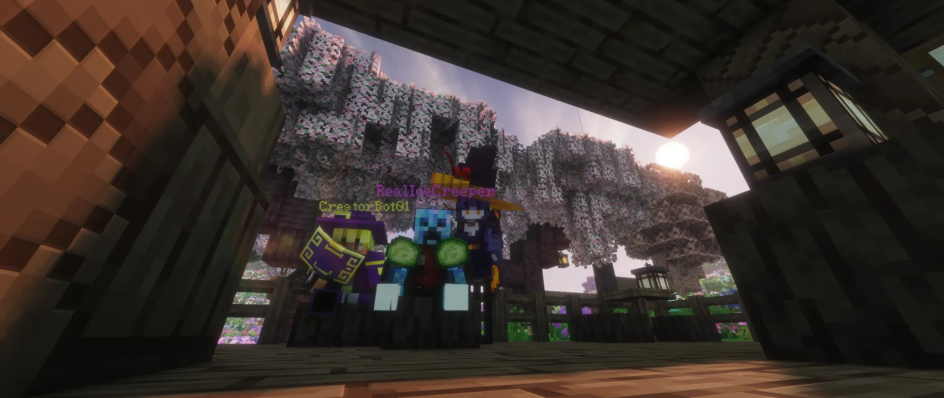 Three Minecraft characters gathered on a wooden café porch beneath hanging lanterns, with pink-leaved trees behind them.