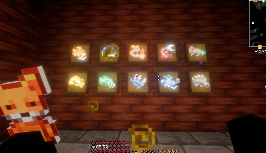 Ten colourful fish displayed in two rows of item frames on a wooden wall, viewed from inside a Minecraft room.